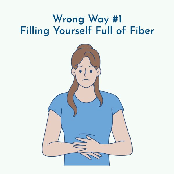 Woman uncomfortable from eating too much fiber