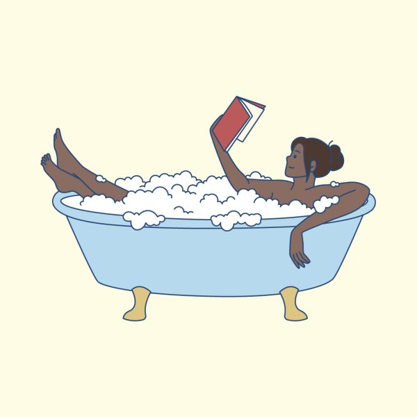 Woman soaking in an epsom salt bath